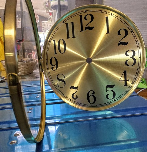 Clock dial with - clock, hinged